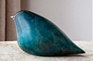 Patinated stylised bird sculpures
