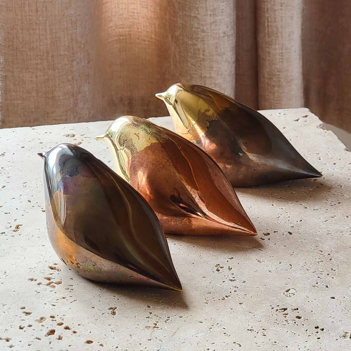 Stylised bird sculptures cast in mixed bronzes Stylised bird sculptures cast in mixed bronzes