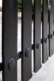 Garden gate with steel rivets