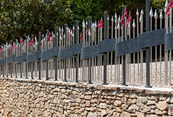 Railings with a texture reflecting the drystone wall