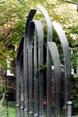 Frameless ached gate
