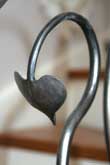 Forged steel leaf detailing from a balustrade