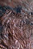 Retriculated surface of a copper wall sculpture