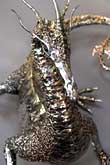 Welded then polished bronze and stainless steel
