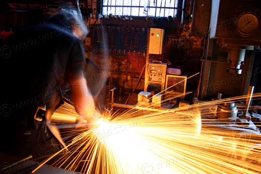 fire welding steel on an anvil