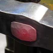 rivetted over tenon